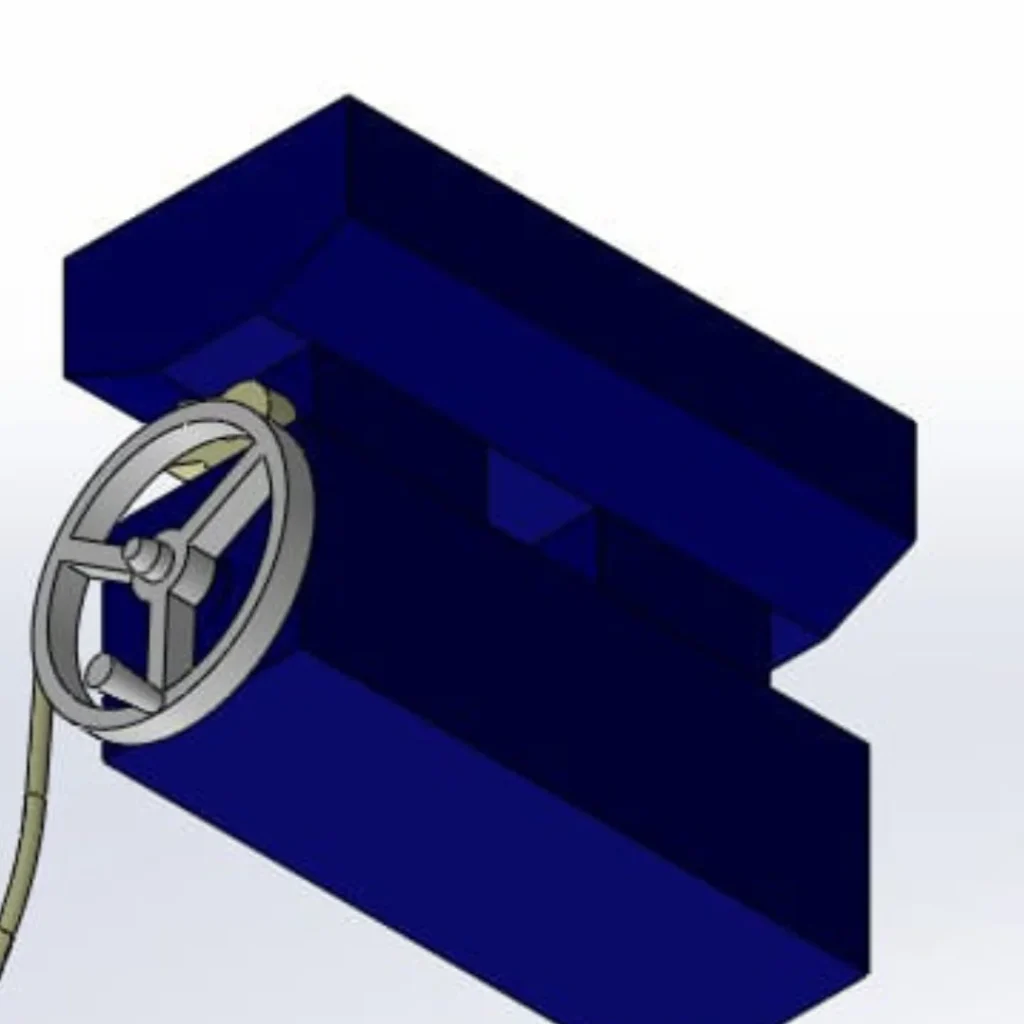 Detailed view of the hand-wheel interface with the main machine housing CAD assembly.
